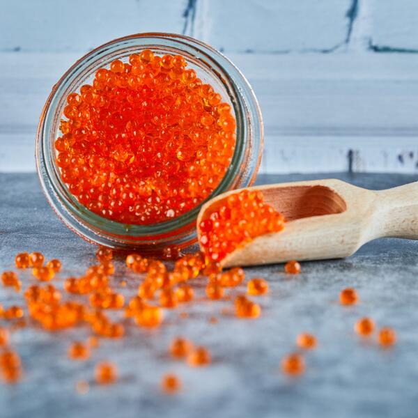 jar-red-caviar-wooden-spoon-marble-background